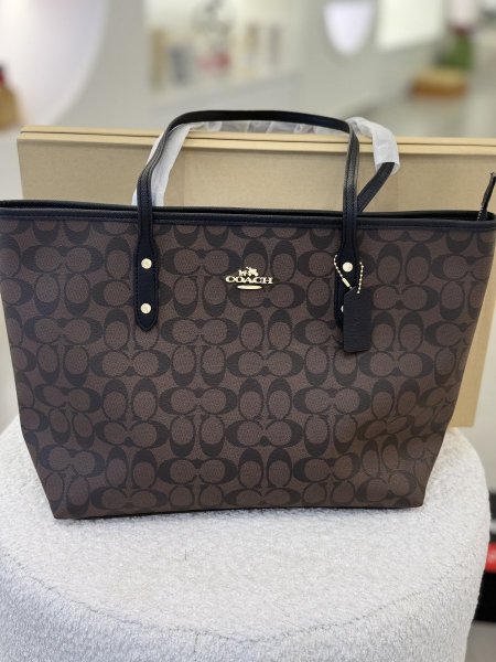 شنطة coach